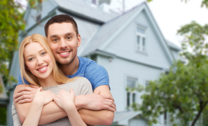 homeowners outside of their home.